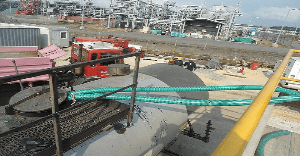 Industrial tanker operations at an oil and gas facility