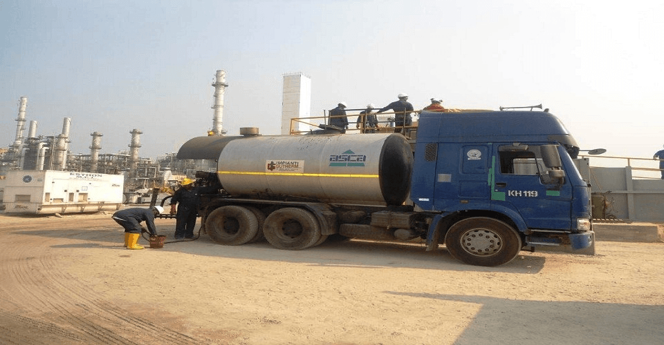 Industrial tanker truck supporting operations at a processing facility